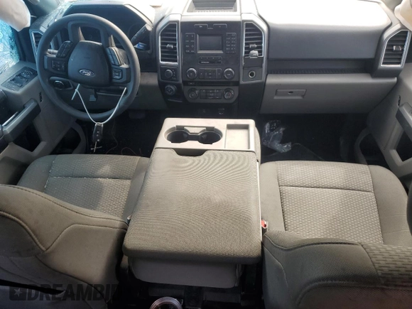 2016 Ford F-150 XLT with VIN 1FTEW1EF4GKE98094, listed as a Copart auction lot 52121985 with 125,000 mi miles and Salvage Title. Bid and sale history available at DreamBid. Image 8.