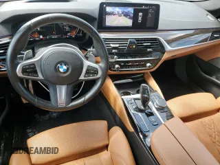 2023 BMW 5 Series 530i with VIN WBA53BH04PWY02486, listed as a Copart auction lot 54519385 with 26,979 mi miles and Salvage title. Bid and sale history available at DreamBid. Image 8.