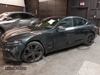 2023 Genesis G70 2.0T with VIN KMTG34TA3PU115553, listed as a IAAI auction lot 41822917 with 35,784 mi miles and . Bid and sale history available at DreamBid. Image 6.