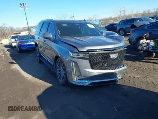 2021 Cadillac Escalade Premium Luxury z VIN 1GYS4CKL2MR231788, wystawiony jako IAAI lot #41630686 z przebiegiem 56 672 mil mil oraz . Historia ofert i sprzedaży dostępna na DreamBid. Obrazek 1.