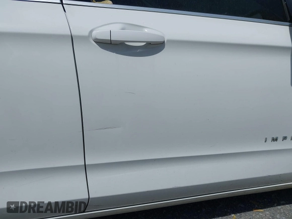 2014 Chevrolet Impala LT with VIN 2G1125S32E9267584, listed as a IAAI auction lot 42079857 with 144,812 mi miles and . Bid and sale history available at DreamBid. Image 19.