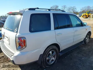 2006 Honda Pilot EX-L with VIN 5FNYF28526B006602, listed as a IAAI auction lot 41212862 with 239,648 mi miles. Bid and sale history available at carsss.com. Image 4.