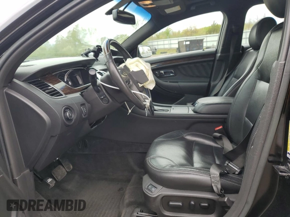 2016 Ford Taurus Limited with VIN 1FAHP2F81GG113129, listed as a Copart auction lot 55770045 with 104,778 mi miles and Salvage title. Bid and sale history available at DreamBid. Image 7.