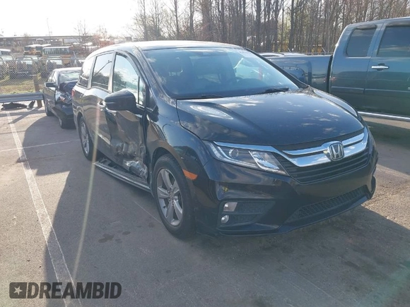2019 Honda Odyssey EX-L with VIN 5FNRL6H74KB061567, listed as a IAAI auction lot 41810919 with 129,146 mi miles. Bid and sale history available at carsss.com. Image 1.