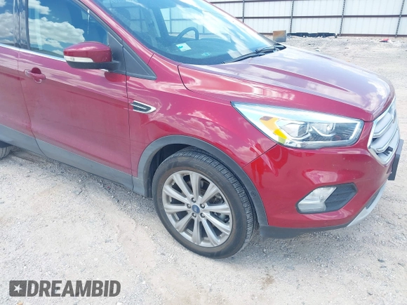 2018 Ford Escape Titanium with VIN 1FMCU0J96JUD58854, listed as a IAAI auction lot 42590609 with 77,825 mi miles and . Bid and sale history available at DreamBid. Image 6.