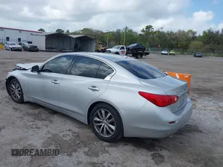 2014 Infiniti Q50 Premium z VIN JN1BV7AP9EM690381, wystawiony jako IAAI lot #41761562 z przebiegiem 107 099 mil mil oraz . Historia ofert i sprzedaży dostępna na DreamBid. Obrazek 3.