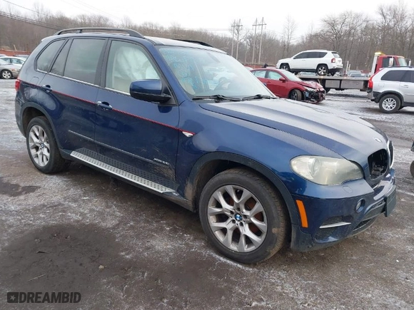 2011 BMW X5 35i with VIN 5UXZV4C54BL738262, listed as a IAAI auction lot 41633474 with 173,914 mi miles. Bid and sale history available at carsss.com. Image 1.