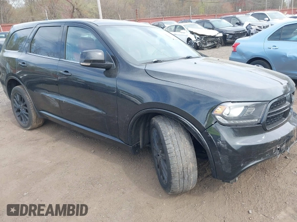 2015 Dodge Durango R/T with VIN 1C4SDJCT3FC156310, listed as a IAAI auction lot 42061041 with 99,621 mi miles and . Bid and sale history available at carsss.com. Image 1.
