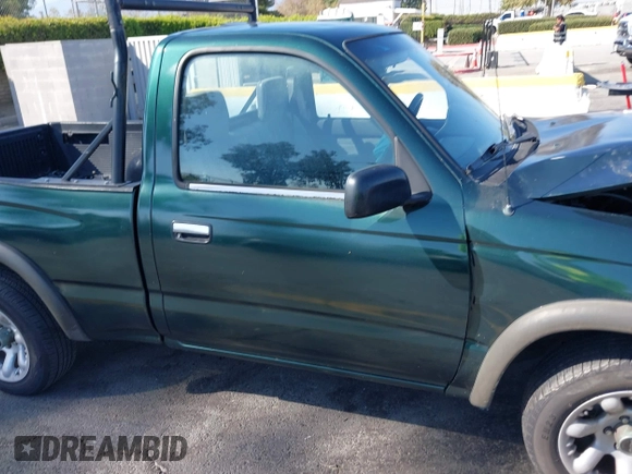 1999 Toyota Tacoma with VIN 4TANL42N7XZ481489, listed as a IAAI auction lot 40365153 with 218,971 mi miles. Bid and sale history available at carsss.com. Image 13.