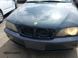 2004 BMW 3 Series 325i with VIN WBAET37424NJ96343, listed as a IAAI auction lot 41721056 with 186,848 mi miles. Bid and sale history available at carsss.com. Image 6.