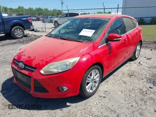 2012 Ford Focus SEL with VIN 1FAHP3M22CL213780, listed as a IAAI auction lot 42071129 with 151,924 mi miles. Bid and sale history available at carsss.com. Image 2.