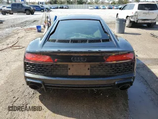 2021 Audi R8 V10 z VIN WUABAAFX7M7900586, wystawiony jako Copart lot #43702475 z przebiegiem 20 246 mil mil oraz Szkoda całkowita • Salvage title. Historia ofert i sprzedaży dostępna na DreamBid. Obrazek 6.