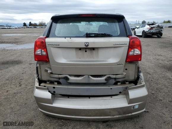 2010 Dodge Caliber SXT with VIN 1B3CB4HA3AD586765, listed as a Copart auction lot 49103085 with 143,509 mi miles and Salvage Title. Bid and sale history available at carsss.com. Image 6.