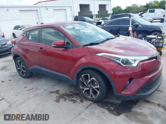 2019 Toyota C-HR XLE with VIN JTNKHMBX0K1017215, listed as a IAAI auction lot 41898189 with 74,239 mi miles. Bid and sale history available at carsss.com. Image 1.