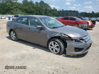 2012 Ford Fusion SE z VIN 3FAHP0HA0CR328833, wystawiony jako Copart lot #57631955 z przebiegiem 94 613 mil mil oraz Szkoda całkowita • Salvage title. Historia ofert i sprzedaży dostępna na DreamBid. Obrazek 4.