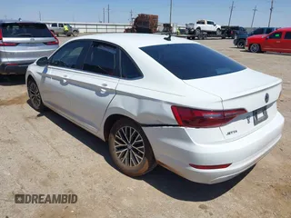 2021 Volkswagen Jetta S z VIN 3VWC57BU8MM035618, wystawiony jako IAAI lot #41998464 z przebiegiem 56 099 mil mil oraz . Historia ofert i sprzedaży dostępna na DreamBid. Obrazek 3.