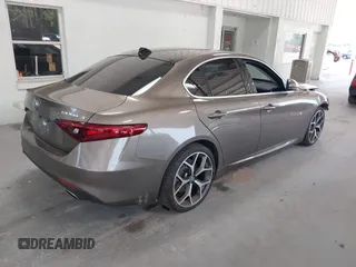 2019 Alfa Romeo Giulia Ti Sport with VIN ZARFAMBN1K7599269, listed as a IAAI auction lot 42271523 with 46,556 mi miles and . Bid and sale history available at DreamBid. Image 4.