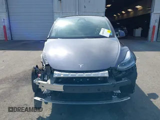 2023 Tesla Model Y Long Range with VIN 7SAYGDEE7PF856985, listed as a IAAI auction lot 42097675 with 13,112 mi miles and . Bid and sale history available at DreamBid. Image 13.