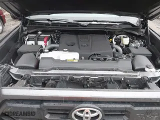 2024 Toyota Tundra 4WD SR5 with VIN 5TFLA5DB0RX215322, listed as a IAAI auction lot 41158494 with 8,389 mi miles. Bid and sale history available at carsss.com. Image 10.