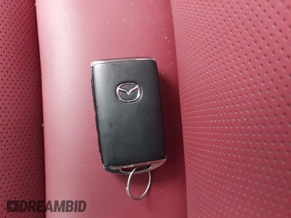 2025 Mazda 3 S Carbon Edition with VIN JM1BPBCM4S1760993, listed as a IAAI auction lot 41446098 with 102 mi miles and . Bid and sale history available at DreamBid. Image 11.