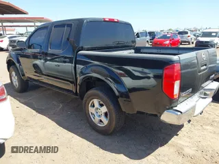 2006 Nissan Frontier SE with VIN 1N6AD07W26C432354, listed as a IAAI auction lot 42093298 with 155,793 mi miles and . Bid and sale history available at DreamBid. Image 3.