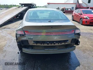 2016 Lincoln MKZ z VIN 3LN6L2J97GR617086, wystawiony jako IAAI lot #42446924 z przebiegiem 107 591 mil mil oraz . Historia ofert i sprzedaży dostępna na DreamBid. Obrazek 16.