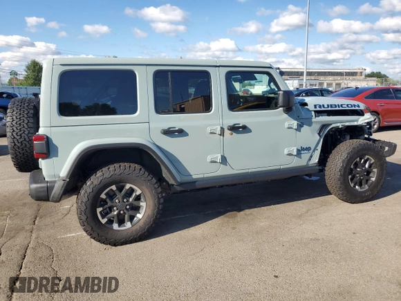 2024 Jeep Wrangler Rubicon z VIN 1C4RJXR64RW279791, wystawiony jako Copart lot #61348324 z przebiegiem 1 387 mil mil oraz Szkoda całkowita • Salvage title. Historia ofert i sprzedaży dostępna na DreamBid. Obrazek 3.