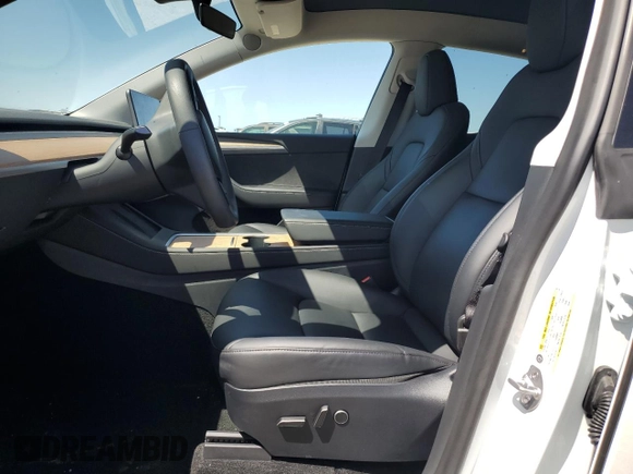 2023 Tesla Model Y Long Range z VIN 7SAYGDEE2PA061792, wystawiony jako Copart lot #52106965 z przebiegiem 11 968 mil mil oraz Szkoda całkowita • Salvage title. Historia ofert i sprzedaży dostępna na DreamBid. Obrazek 7.