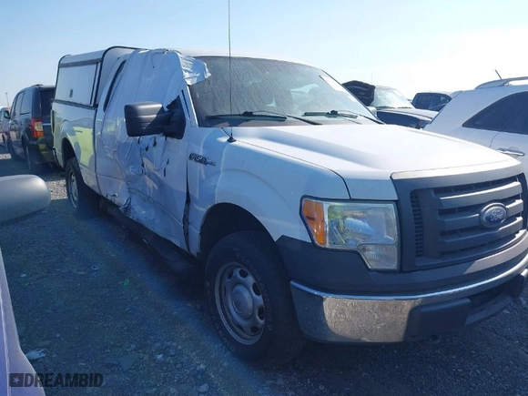 2010 Ford F-150 XL with VIN 1FTEX1E88AKE76184, listed as a IAAI auction lot 41715520 with 157,449 mi miles. Bid and sale history available at carsss.com. Image 1.
