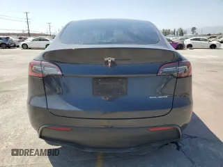 2024 Tesla Model Y Long Range z VIN 7SAYGDEE0RF062395, wystawiony jako Copart lot #55071185 z przebiegiem 42 747 mil mil oraz Szkoda całkowita • Salvage title. Historia ofert i sprzedaży dostępna na DreamBid. Obrazek 6.