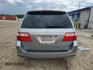 2007 Honda Odyssey EX-L z VIN 5FNRL38657B011922, wystawiony jako Copart lot #56147975 z przebiegiem 149 451 mil mil oraz Szkoda całkowita • Salvage title. Historia ofert i sprzedaży dostępna na DreamBid. Obrazek 6.