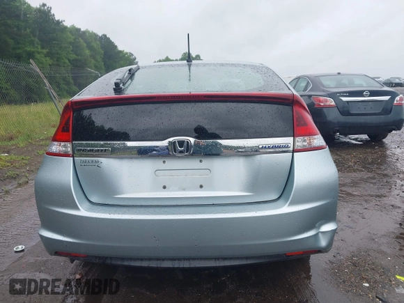 2012 Honda Insight LX z VIN JHMZE2H54CS002149, wystawiony jako IAAI lot #42237680 z przebiegiem 144 826 mil mil oraz . Historia ofert i sprzedaży dostępna na DreamBid. Obrazek 16.