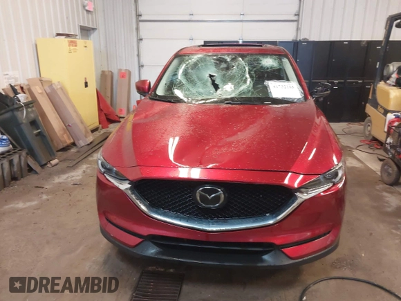 2020 Mazda CX-5 Grand Touring with VIN JM3KFBDMXL0840847, listed as a IAAI auction lot 41732185 with 36,248 mi miles. Bid and sale history available at carsss.com. Image 12.