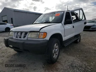 1999 Kia Sportage with VIN KNDJA7233X5600719, listed as a Copart auction lot 80529384 with 56,657 mi miles and Salvage Title. Bid and sale history available at carsss.com. Image 1.