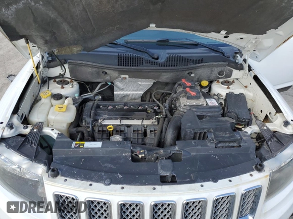 2014 Jeep Compass Latitude with VIN 1C4NJCEAXED531759, listed as a Copart auction lot 50620335 with 144,803 mi miles and Salvage Title. Bid and sale history available at carsss.com. Image 13.