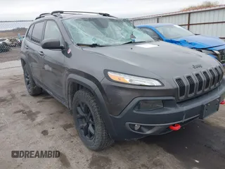 2015 Jeep Cherokee Trailhawk with VIN 1C4PJMBS0FW668730, listed as a IAAI auction lot 41462037 with 83,454 mi miles. Bid and sale history available at carsss.com. Image 1.