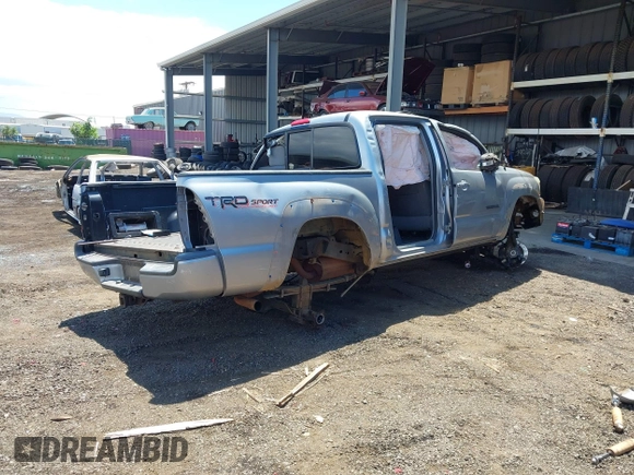 2015 Toyota Tacoma with VIN 3TMLU4ENXFM185841, listed as a IAAI auction lot 41896752 with 111,629 mi miles and . Bid and sale history available at DreamBid. Image 4.