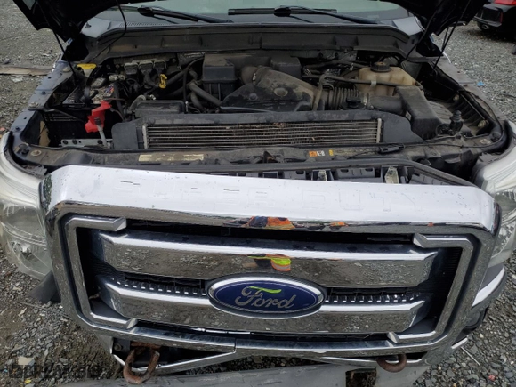 2013 Ford Super Duty F-350 SRW Lariat with VIN 1FT8X3B67DEA77863, listed as a Copart auction lot 66240574 with 189,210 mi miles and Salvage Title. Bid and sale history available at carsss.com. Image 11.