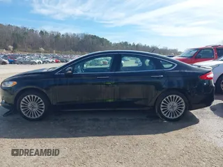 2016 Ford Fusion Titanium with VIN 3FA6P0K92GR284491, listed as a IAAI auction lot 41824323 with 148,016 mi miles. Bid and sale history available at carsss.com. Image 14.
