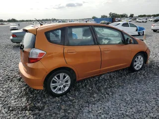 2011 Honda Fit Sport with VIN JHMGE8H59BC007883, listed as a Copart auction lot 54194635 with 123,256 mi miles and Salvage Title. Bid and sale history available at DreamBid. Image 3.