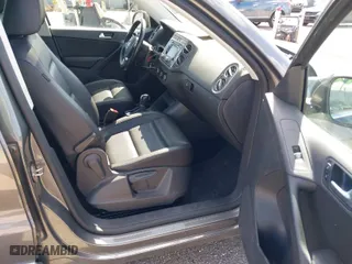 2012 Volkswagen Tiguan SE w/Sunroof & Nav with VIN WVGBV7AX4CW000207, listed as a IAAI auction lot 41889815 with 138,669 mi miles. Bid and sale history available at carsss.com. Image 5.