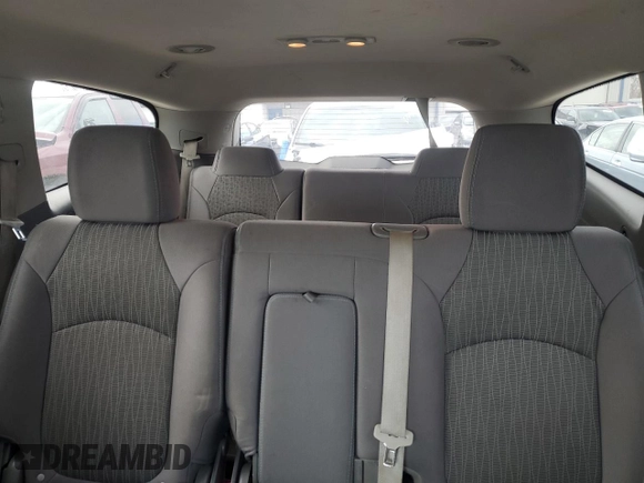 2016 Chevrolet Traverse LS z VIN 1GNKRFED0GJ203317, wystawiony jako Copart lot #52224485 z przebiegiem 144 729 mil mil oraz Czysty tytuł • Clean title. Historia ofert i sprzedaży dostępna na DreamBid. Obrazek 10.