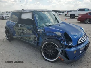 2006 MINI Hardtop with VIN WMWRC33566TK15023, listed as a Copart auction lot 76392014 with Not provided miles and Salvage title. Bid and sale history available at DreamBid. Image 4.