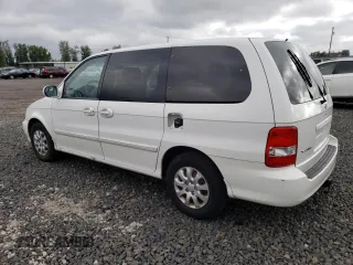 2004 Kia Sedona LX with VIN KNDUP131346544101, listed as a Copart auction lot 72207784 with 0 mi miles and Salvage Title. Bid and sale history available at carsss.com. Image 2.