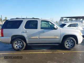 2007 GMC Yukon SLT with VIN 1GKFC13077J253697, listed as a IAAI auction lot 41277881 with 246,059 mi miles. Bid and sale history available at carsss.com. Image 13.