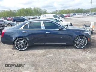2015 Cadillac CTS Luxury AWD with VIN 1G6AX5SX5F0119102, listed as a IAAI auction lot 42231015 with 106,643 mi miles and . Bid and sale history available at DreamBid. Image 13.