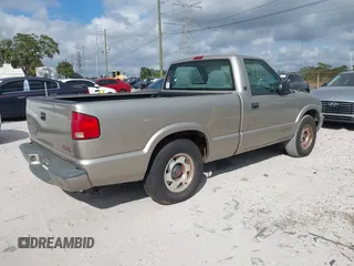 1999 GMC Sonoma with VIN 1GTCS144XX8502911, listed as a IAAI auction lot 41160683 with 119,776 mi miles. Bid and sale history available at carsss.com. Image 4.