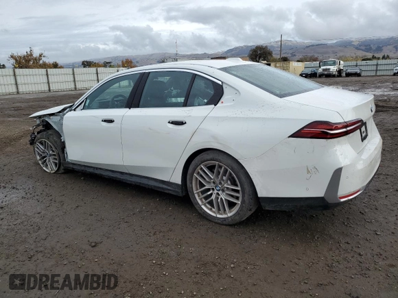 2024 BMW 5 Series 530i with VIN WBA43FJ0XRCS14707, listed as a Copart auction lot 84764324 with 7,409 mi miles and Salvage Title. Bid and sale history available at carsss.com. Image 2.