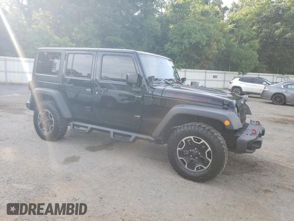 2016 Jeep Wrangler Unlimited Rubicon with VIN 1C4HJWFG9GL220687, listed as a Copart auction lot 60552705 with 49,525 mi miles and Salvage title. Bid and sale history available at DreamBid. Image 4.