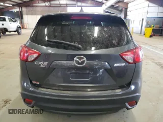 2014 Mazda CX-5 Grand Touring with VIN JM3KE4DY4E0344320, listed as a Copart auction lot 51731885 with 115,396 mi miles and Clean Title. Bid and sale history available at carsss.com. Image 6.